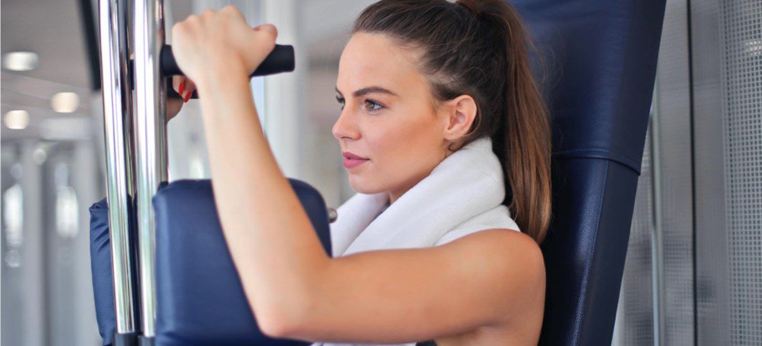 woman working out her arms after a surgery